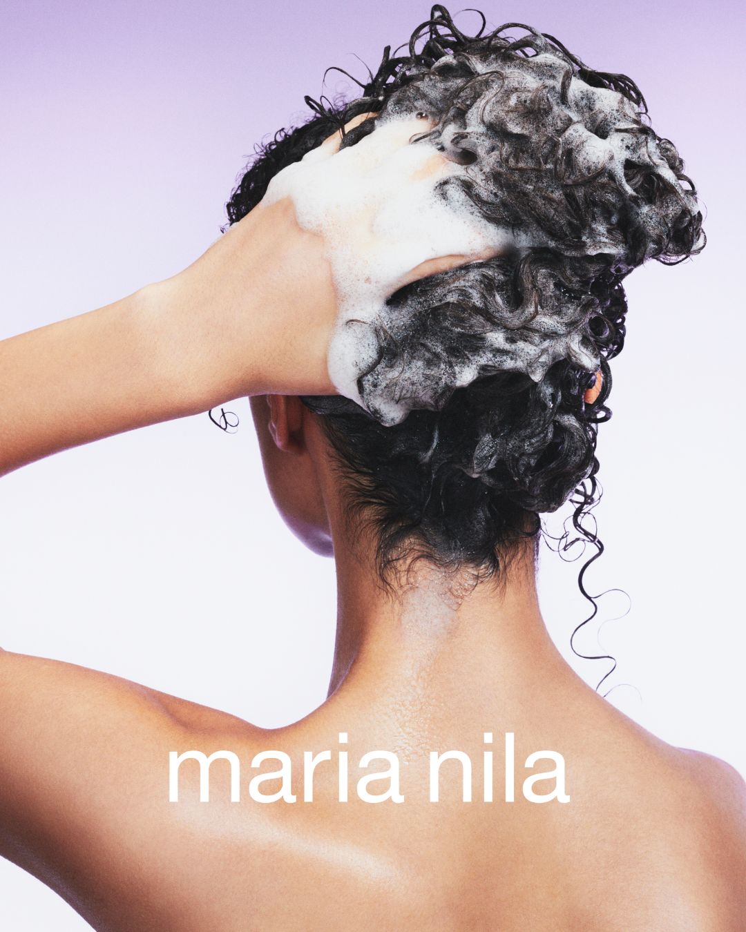 Flacon de shampoing purifiant antipelliculaire Maria Nila Purifying Cleanse de 350 ml, sur fond neutre, avec bouchon noir et design minimaliste.